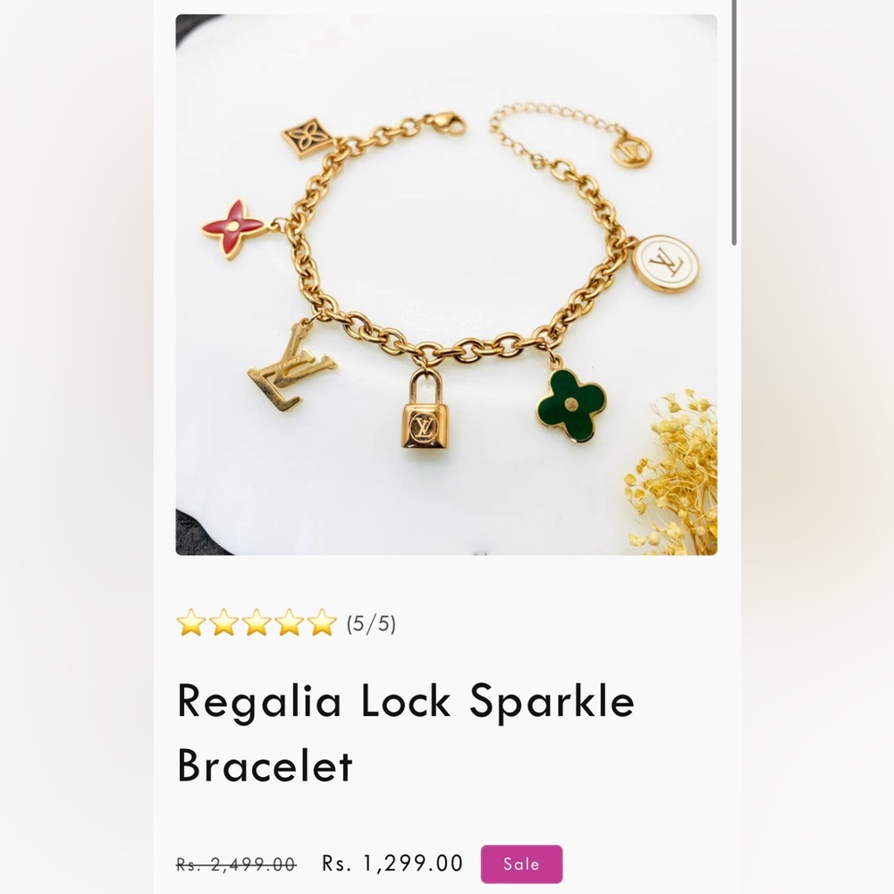 - Authentic Gold LV bracelet